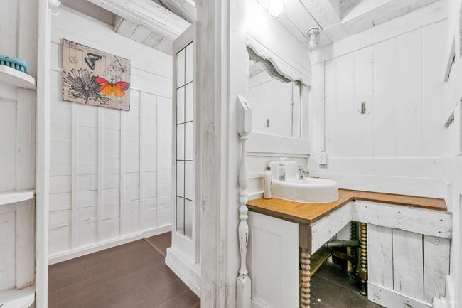 Bathroom with wood finished floors and vanity | Image 24