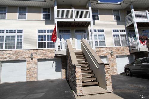 304 Beachwalk Trl, Luna Pier, MI, 48157-9402 | Card Image