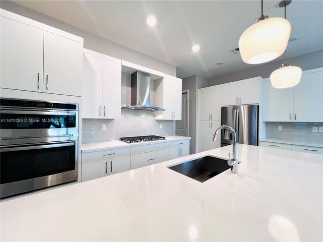 12070 - 12070 N Baypoint Cir, House other with 3 bedrooms, 2 bathrooms and null parking in Parkland FL | Image 8