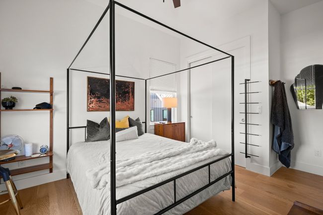 Bedroom with wood finished floors and baseboards | Image 20