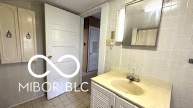 bathroom with tile patterned flooring and vanity | Image 14