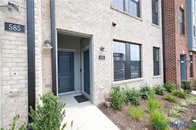 Property entrance with brick siding | Image 4