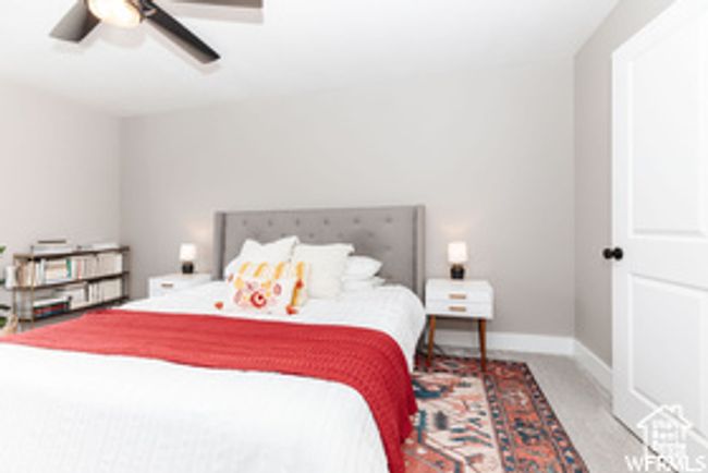 Bedroom with baseboards and ceiling fan | Image 6
