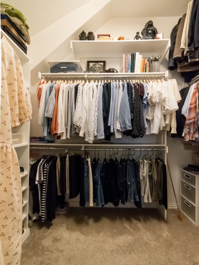 Walk-in closet in Primary Bedroom with abundant hanging rods and storage shelving. | Image 26