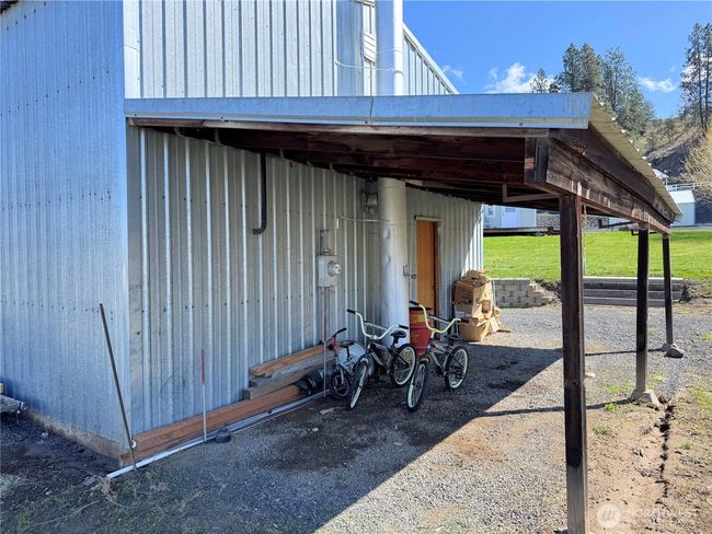 Lean-to off the rear of the garage. | Image 23