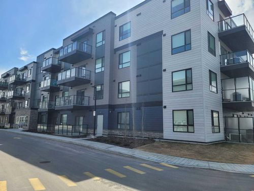 1202 - 42 Cranbrook Gardens Se, Home with 2 bedrooms, 2 bathrooms and 1 parking in Calgary AB | Card Image