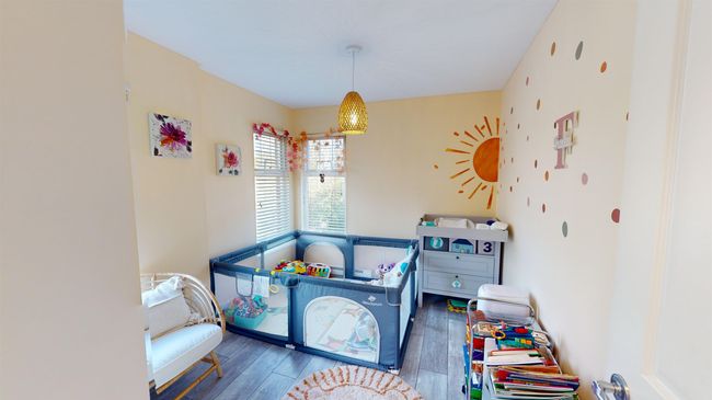 Bedroom featuring wood finished floors | Image 9