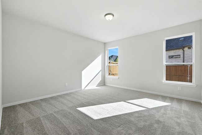 Carpeted spare room featuring baseboards | Image 13
