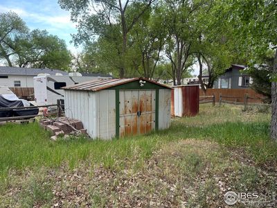 Two sheds on the property for extra storage | Image 2