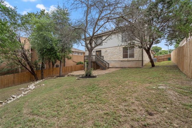 View of yard with a fenced backyard | Image 36