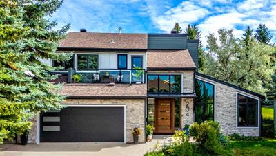 204 Pump Hill View Sw, House detached with 4 bedrooms, 4 bathrooms and 4 parking in Calgary AB | Image 1