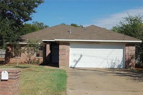 1202 Spell Ave, Cleburne, TX, 76033-8736 | Card Image