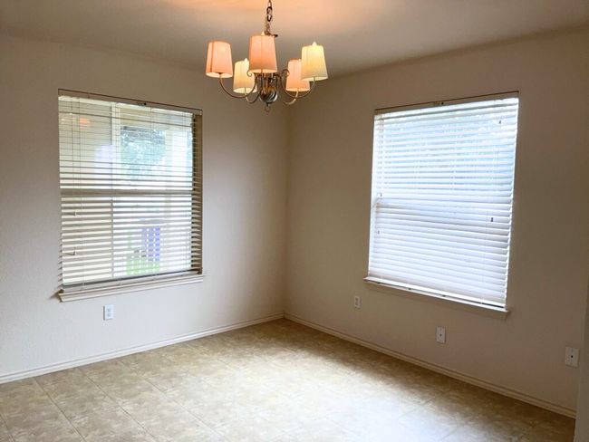 Dining room with lots of natural light and baseboards | Image 8