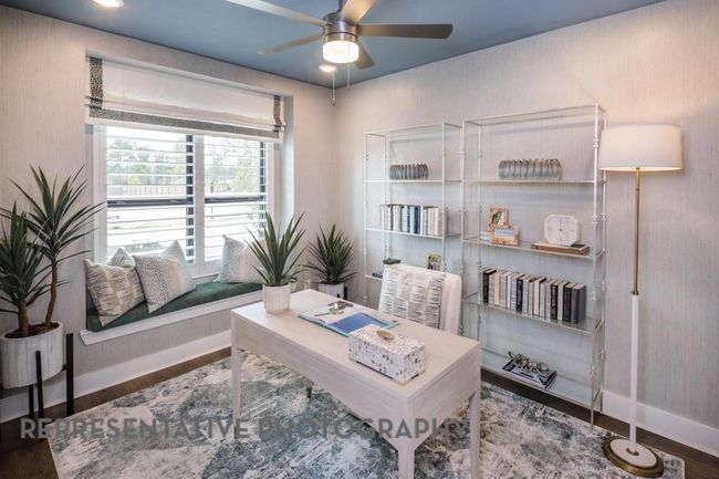 Office area featuring a ceiling fan and wood finished floors | Image 26