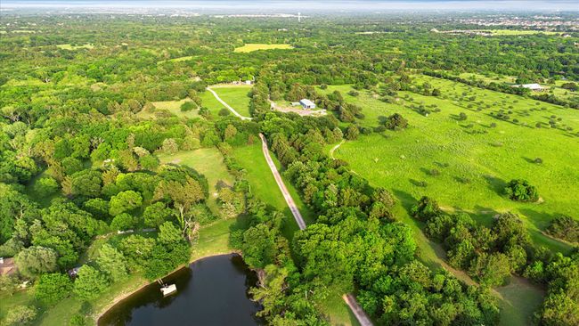 Birds eye view of property featuring a water view and a wooded view | Image 22
