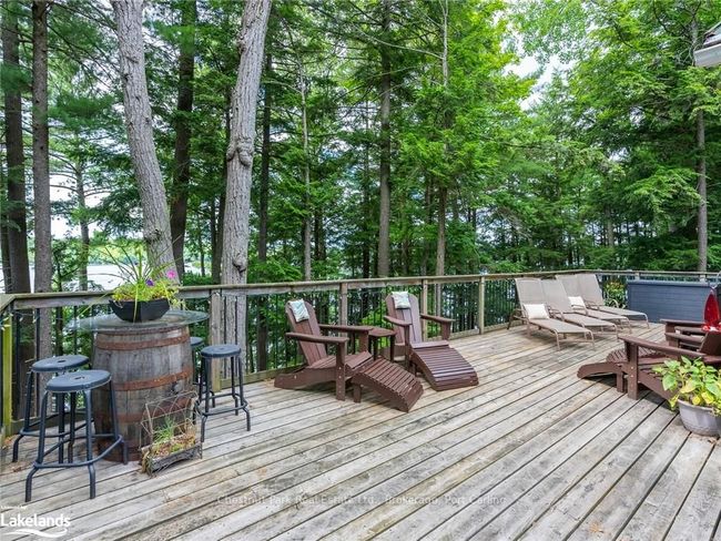 Large wrap around deck for south and west exposures | Image 34