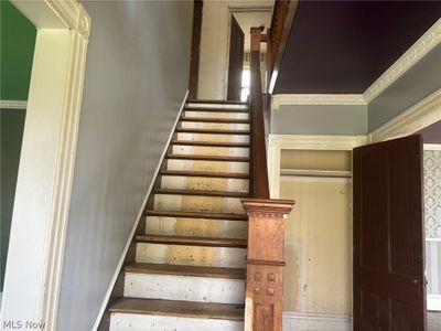 Stairs featuring ornamental molding | Image 2