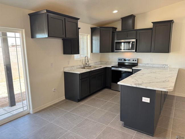 3760 E Santa Palmira St, Home with 3 bedrooms, 2 bathrooms and 2 parking in San Luis AZ | Image 6