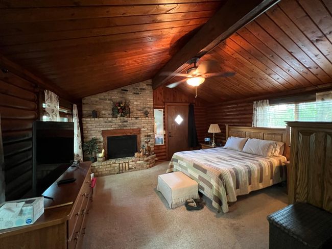 Huge primary suite that used to be the living room in the original home | Image 17
