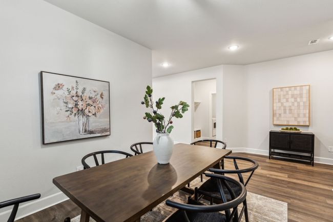 Dining area featuring baseboards, recessed lighting, and wood finished floors | Image 17