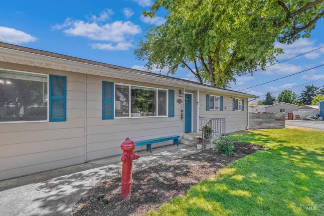 Single story home with a front yard | Image 4