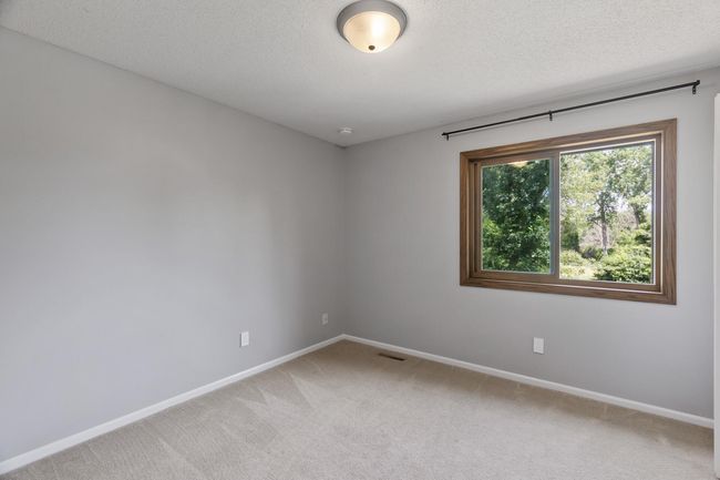 2nd upper level bedroom with new window | Image 25