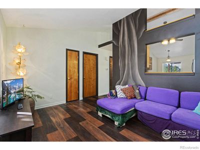 Living room with vaulted ceiling | Image 3