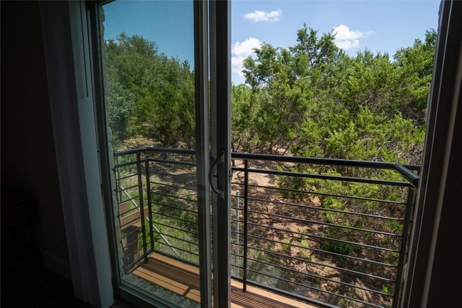 Primary bedroom balcony view | Image 28