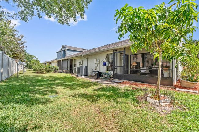 98 Lakepointe Cir, Townhouse with 3 bedrooms, 2 bathrooms and null parking in KISSIMMEE FL | Image 22
