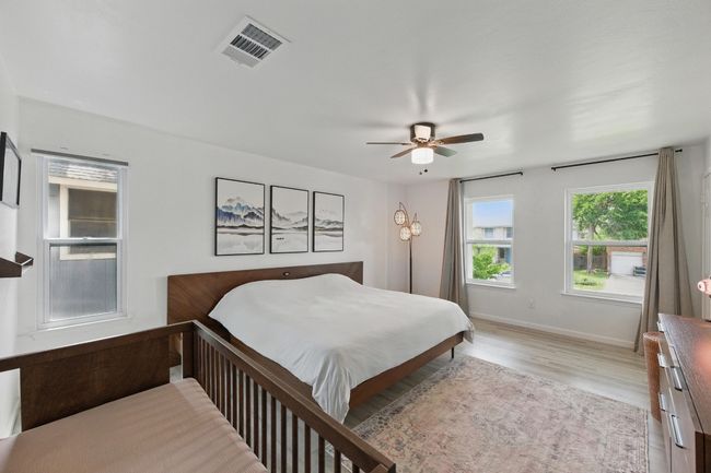 Modern updates throughout the primary suite create a welcoming, high-end retreat with every comfort in mind. | Image 16