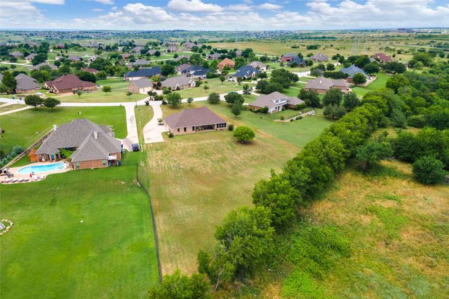 Aerial view of residential area featuring a pool area | Image 35