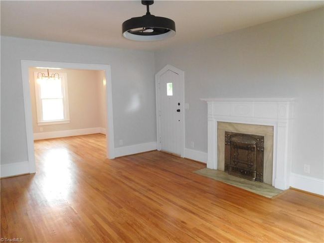 LIVING ROOM FLOWS INTO THE DINING ROOM. | Image 4