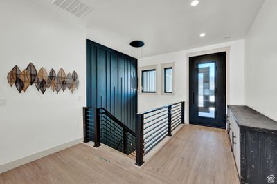 Foyer entrance with light hardwood / wood-style flooring | Image 2