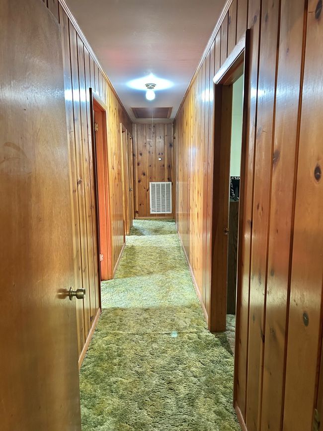 Looking down the hallway to the 3 beds and 1 bath | Image 33