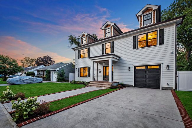 View of front of house featuring driveway and a garage | Image 17