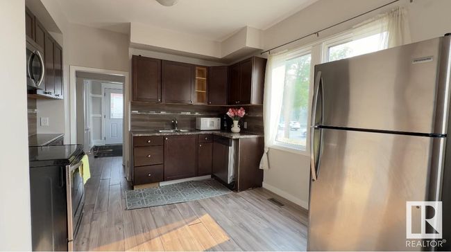 9862 76 Ave Nw, House other with 6 bedrooms, 3 bathrooms and null parking in Edmonton AB | Image 6