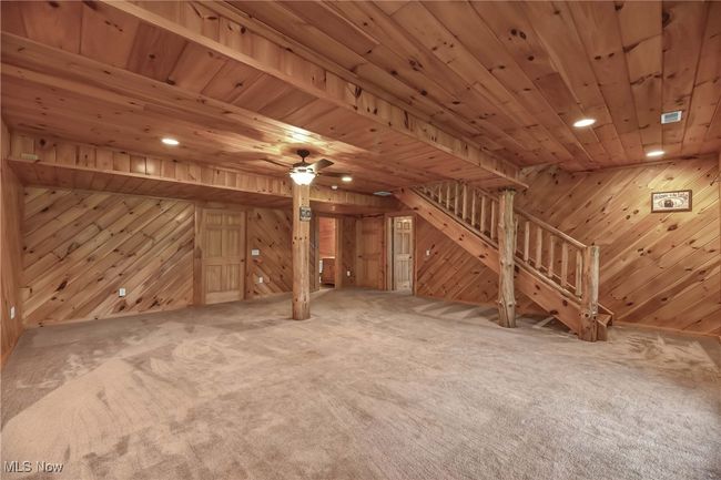 Lower level carpeted rec room | Image 32