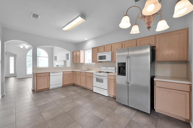 Preparing meals will be a breeze thanks to the abundant countertop space, with room for all your kitchen gadgets. | Image 12