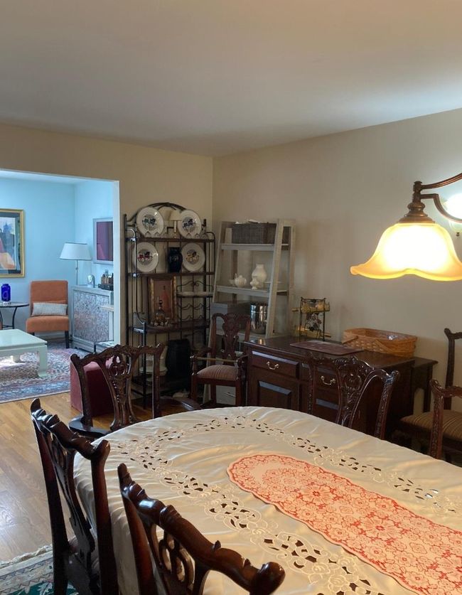 Dining room featuring wood finished floors | Image 26