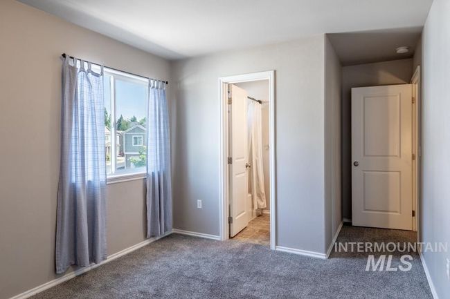 Unfurnished bedroom featuring carpet and ensuite bath | Image 13