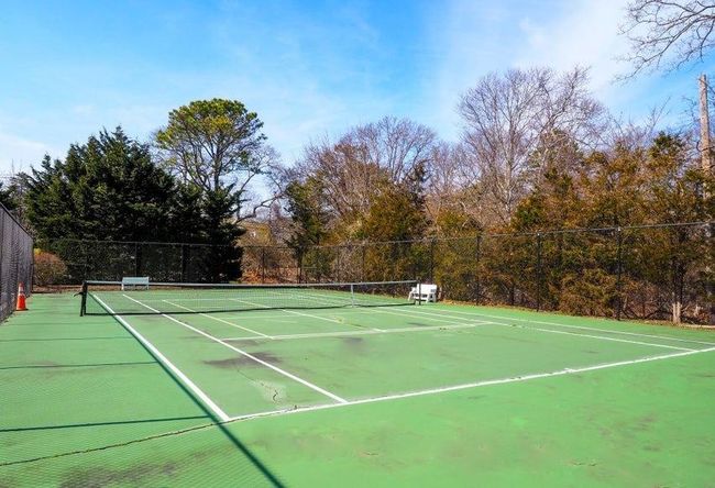 View of sport court featuring fence | Image 31