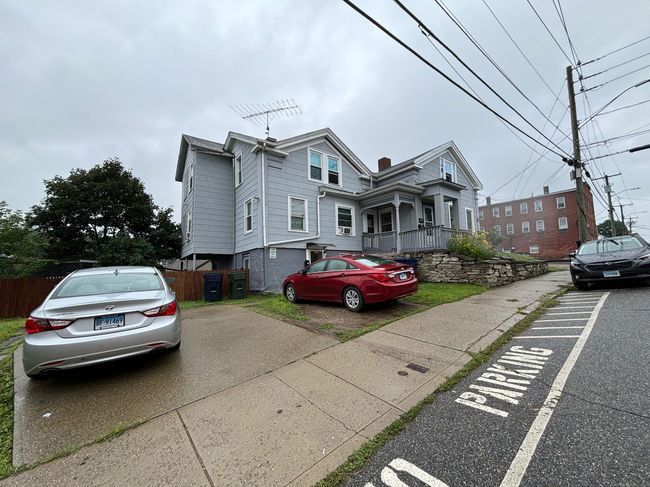 151 Union St, Home with 8 bedrooms, 3 bathrooms and 3 parking in Willimantic CT | Image 4