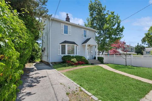 12 Clarkson St, Malverne, NY, 11565-1703 | Card Image