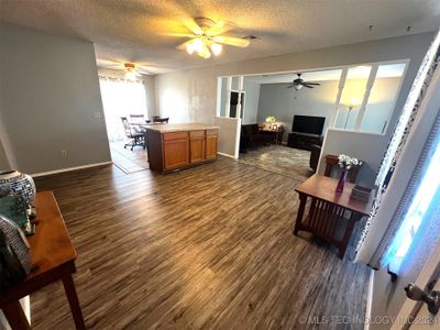 View of formal dining room/extra living space from just inside the front door | Image 3