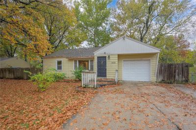 Single story home with a garage | Image 1