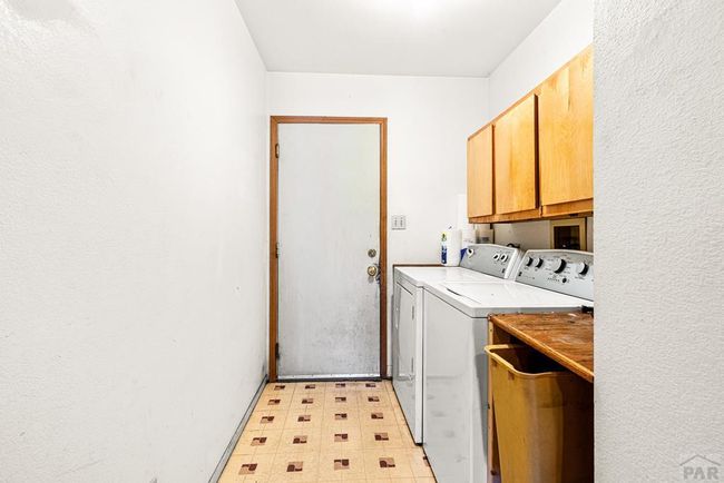 exit to 2 car detached garage, laundry room | Image 20
