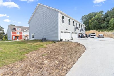 Rear parking and garage entry | Image 1