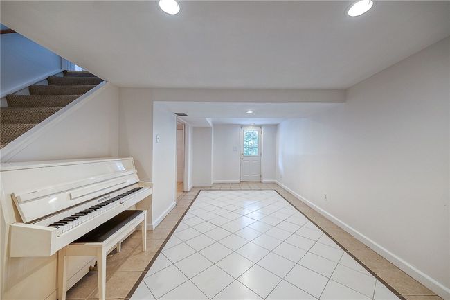 Game room in basement. | Image 17