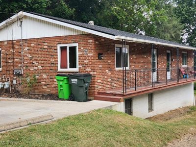 View of front of property with view of deck area | Image 1