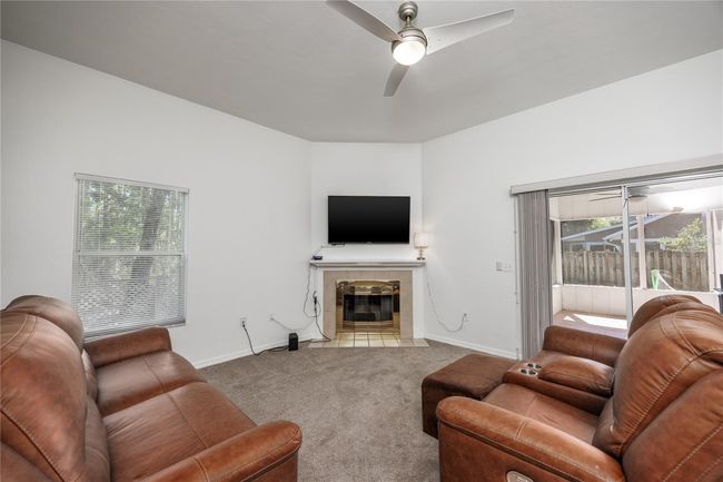 Family room with fireplace | Image 19